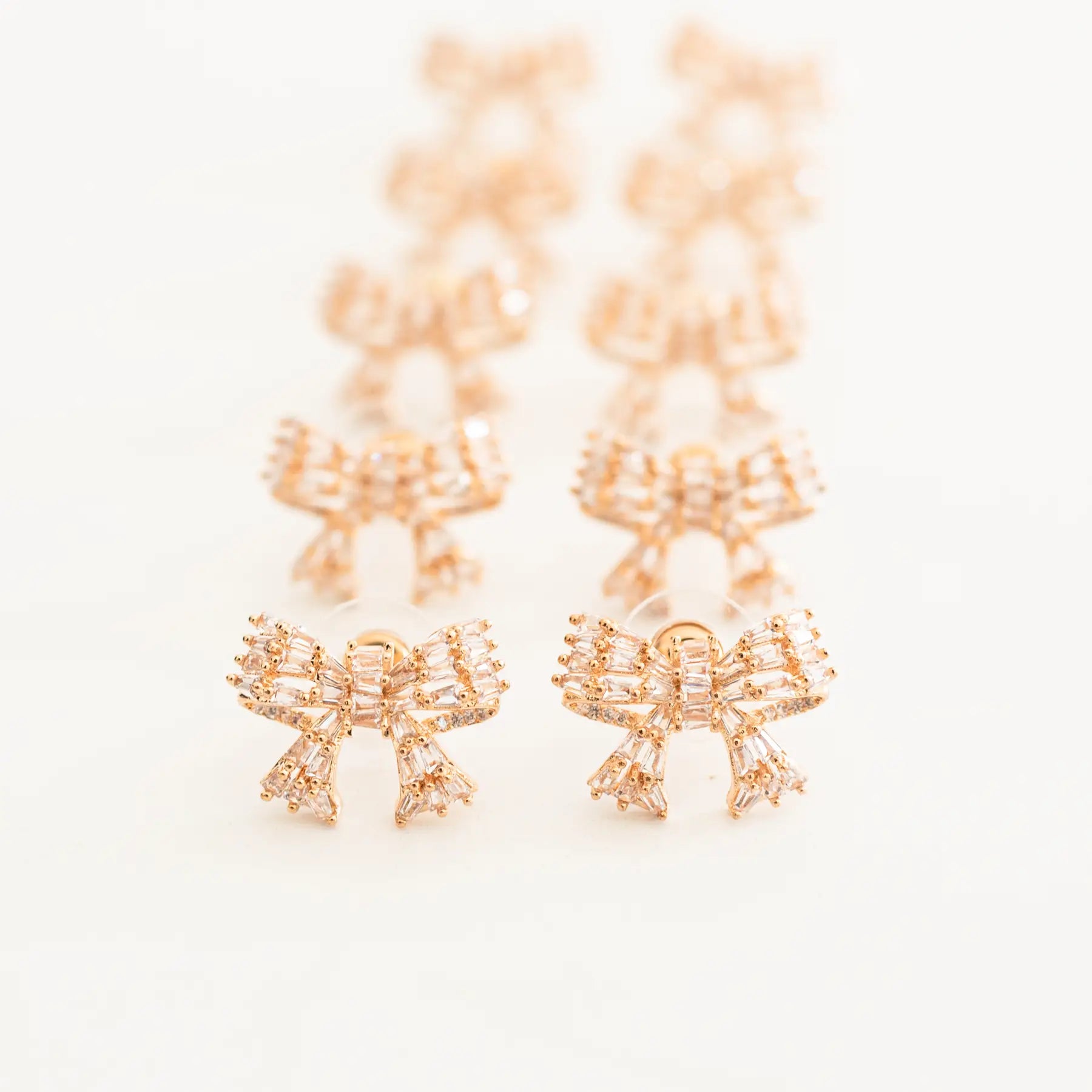 Gold Mini Sparkler Statement Stud Bow Earrings-110 Jewelry & Hair-St Armands Designs of Sarasota-July & June Women's Fashion Boutique Located in San Antonio, Texas